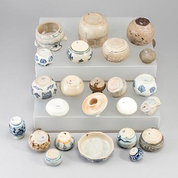 A group of 24 Southeast asian ceramic jars and boxes, 18-19th century.