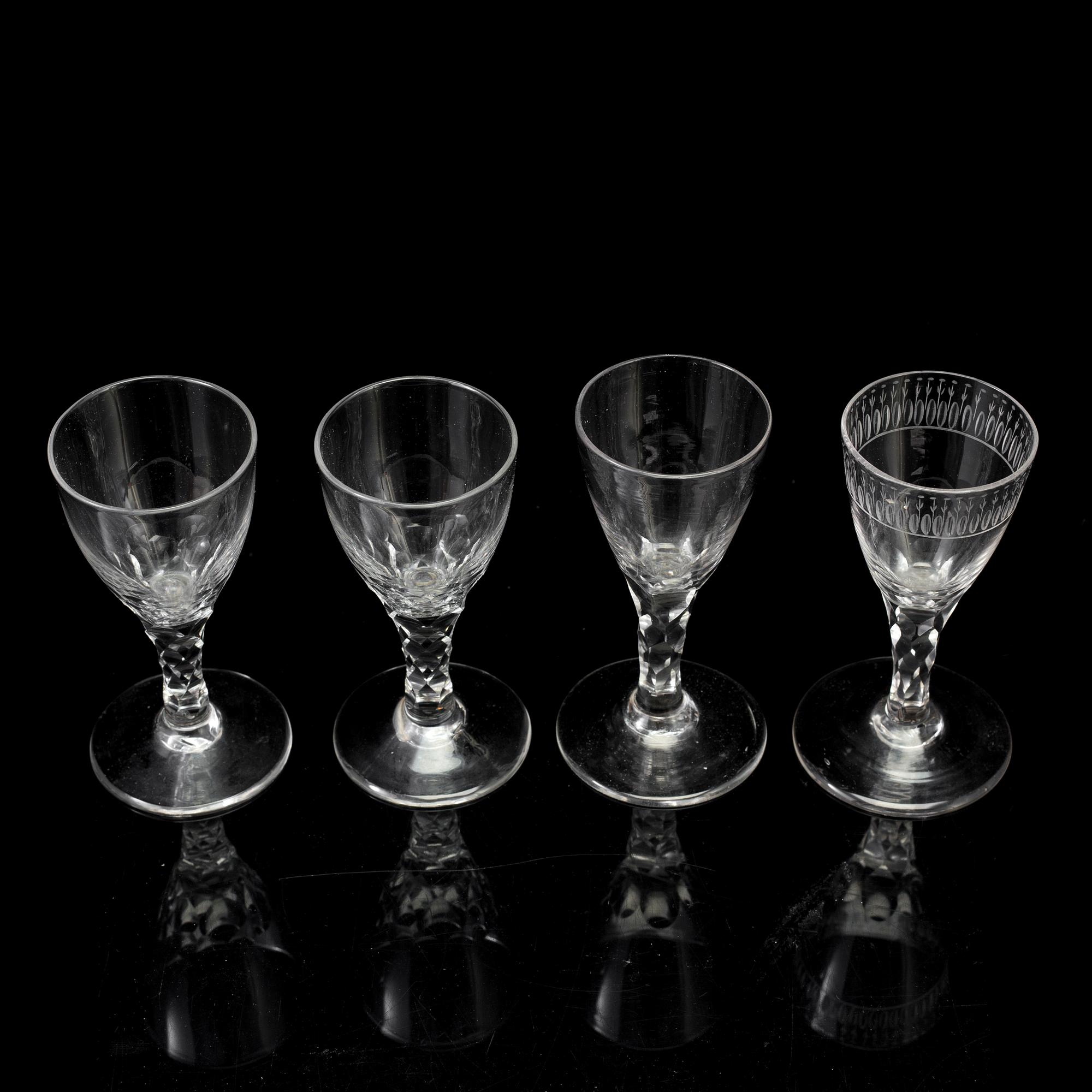 FOUR WINE GLASSES, late 18th or early 19th century.