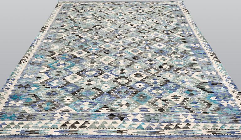 A Kilim carpet, ca 290 x 199 cm.