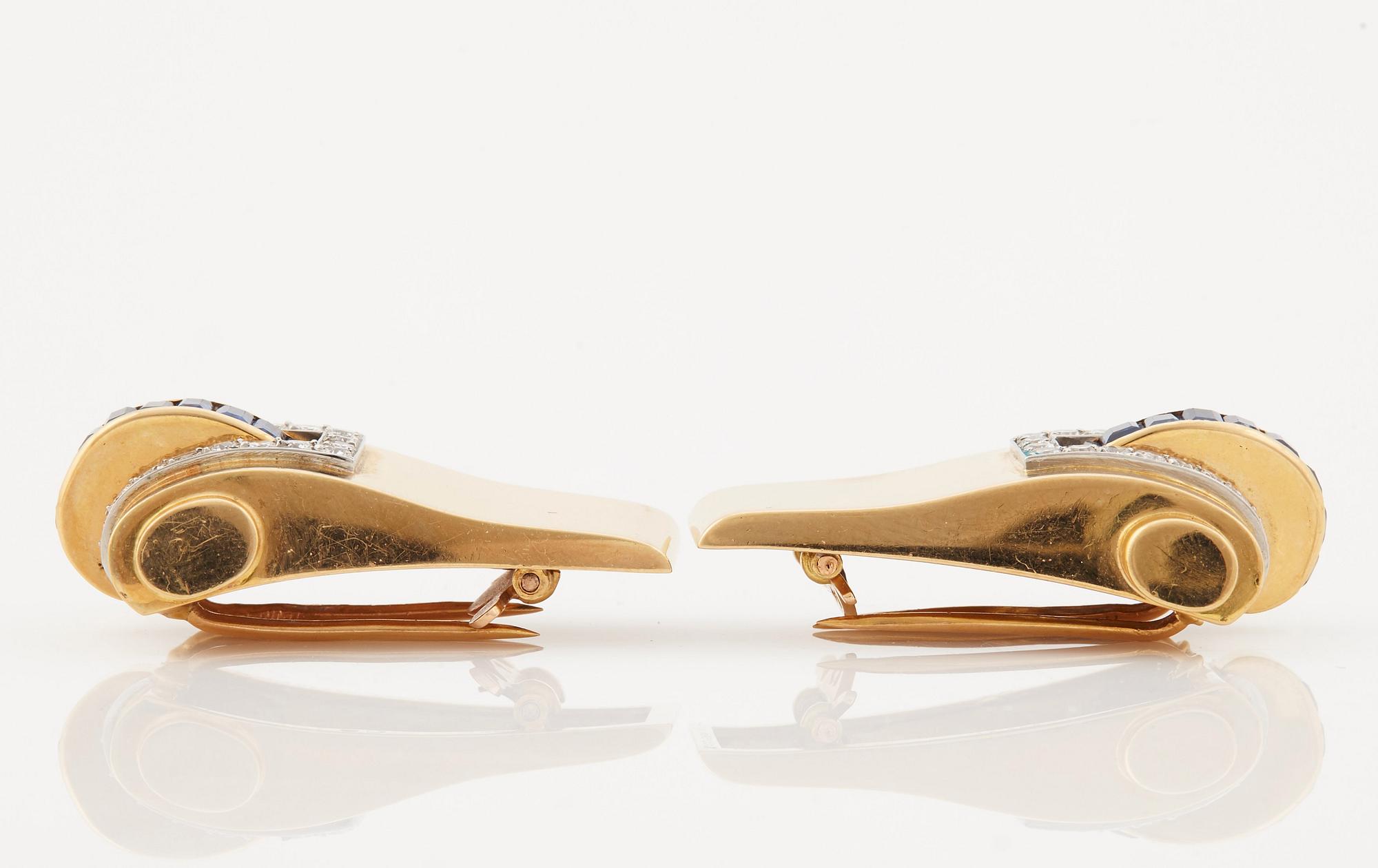 A pair of 1940/50's brooches by Boucheron, set with baguette cut sapphires, brilliant- and single cut diamonds.