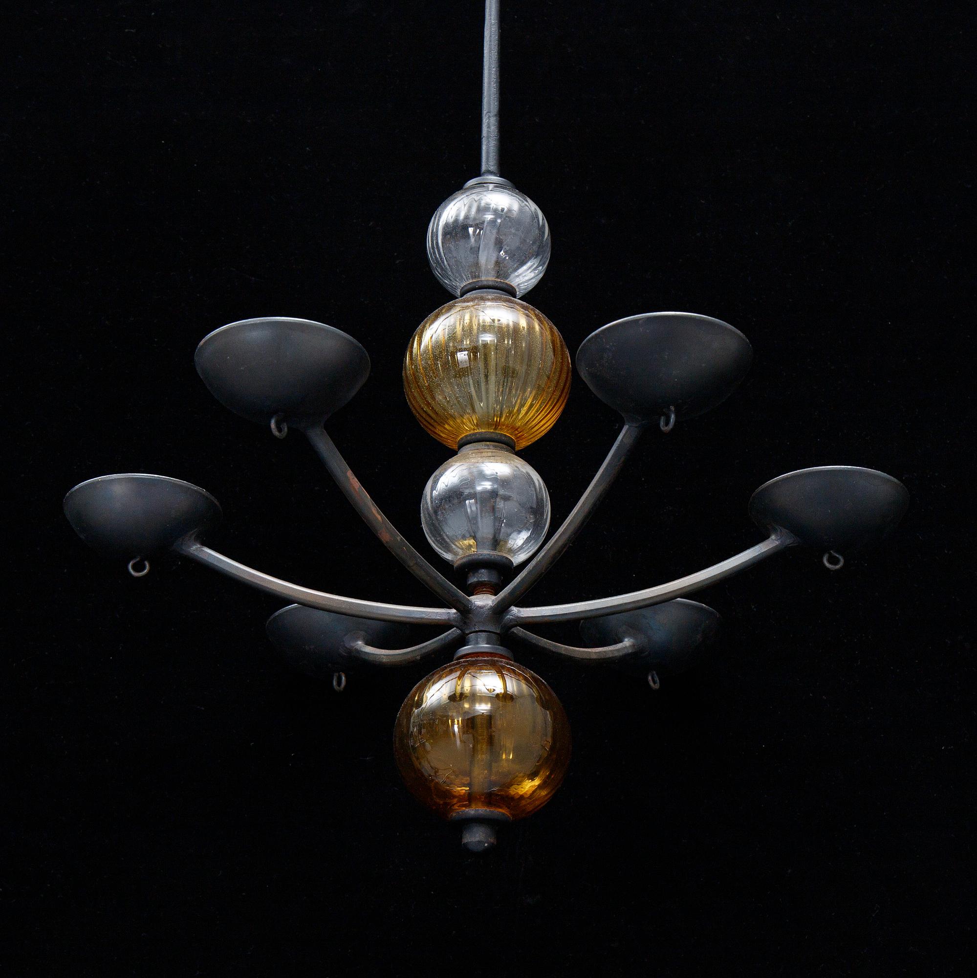 Carl Kihlberg, a Boda Smide glass and iron chandelier.
