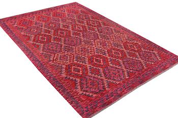 A Kilim carpet, c. 295 x 200 cm.