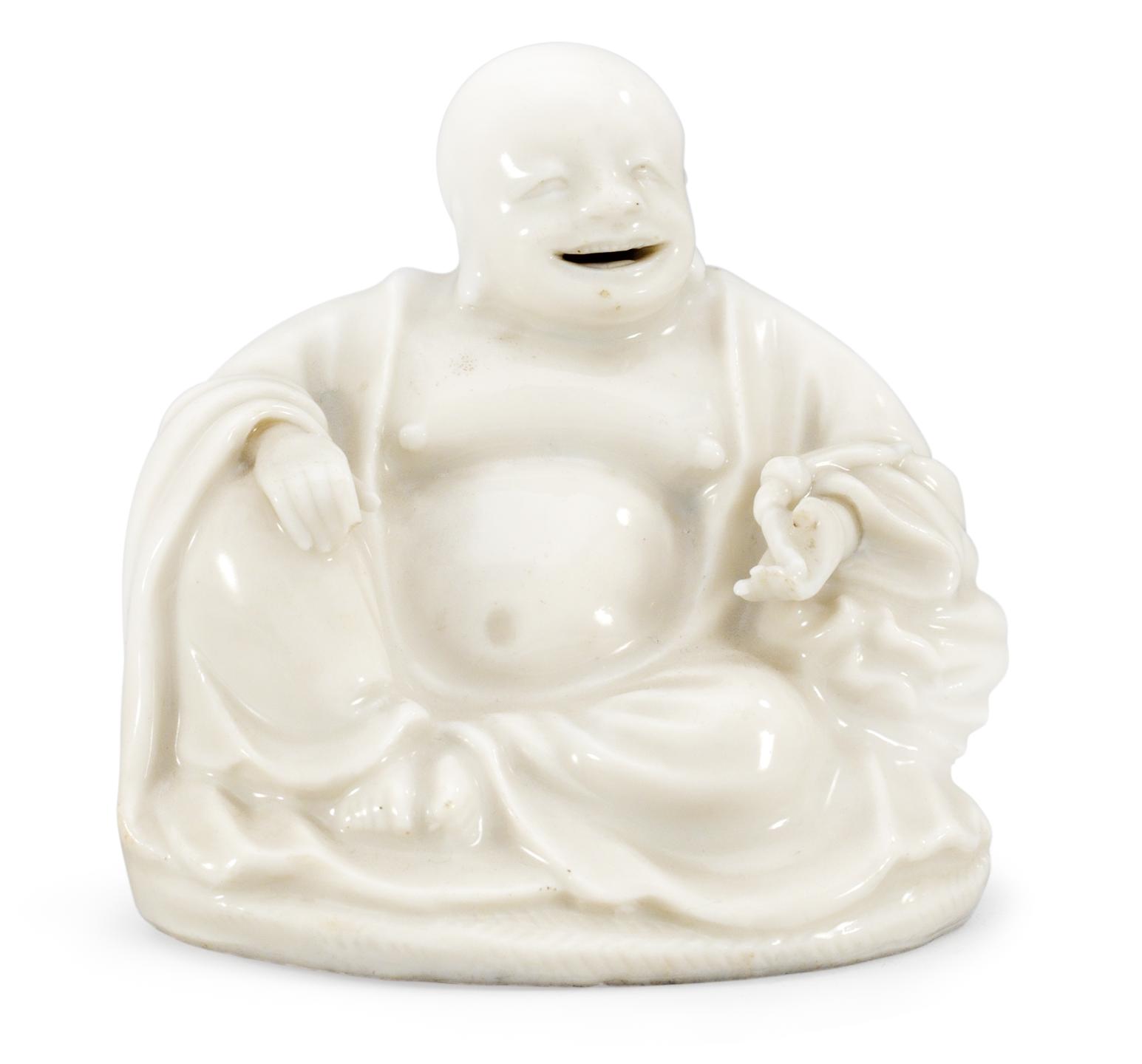 A porcelain figure of Buddhai, Qing dynasty.