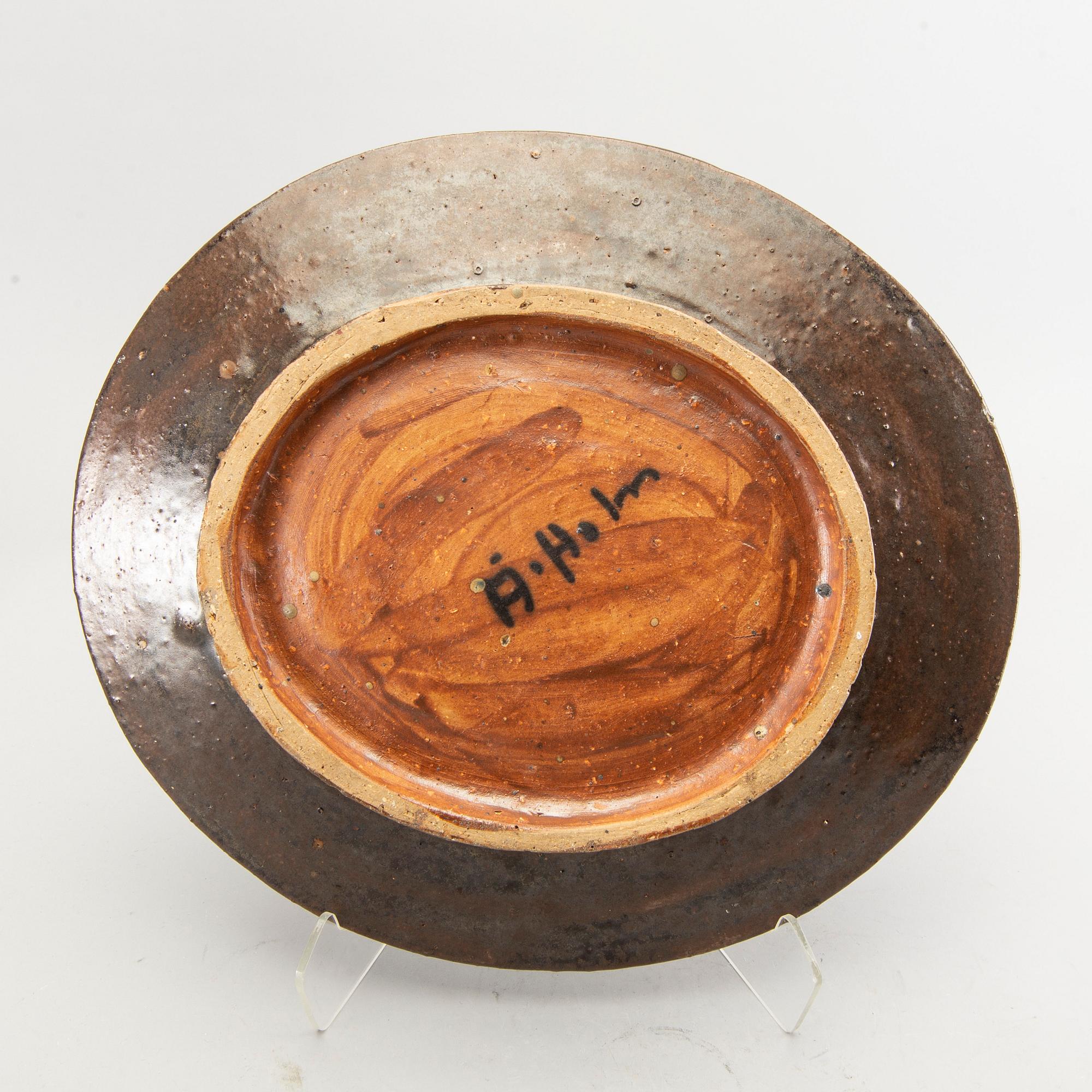 Two signed stonewear plates by Åke Holm.