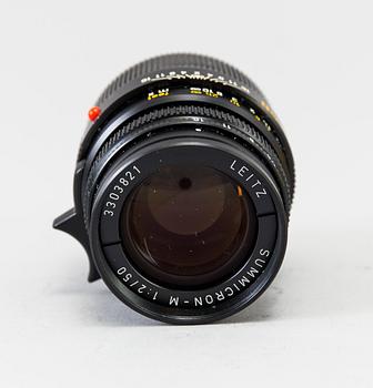 a black body Leica M4-P camera with no 1605951 made by Leitz Canada in 1982. With two lenses and a Leica Meter.