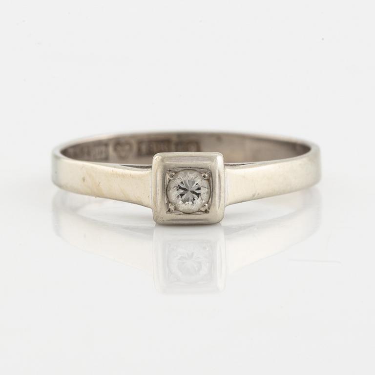 White gold and brilliant cut diamond ring.
