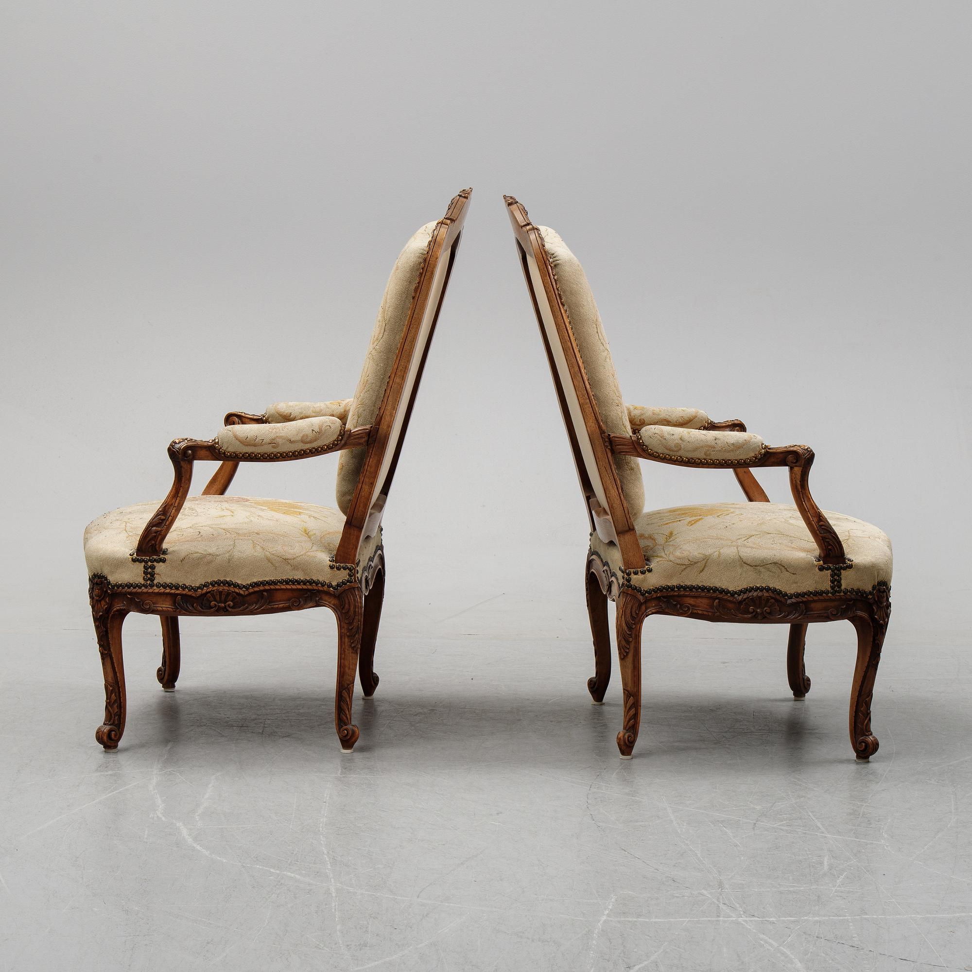 A pair of Louis XV style armchairs from early 20th Century.