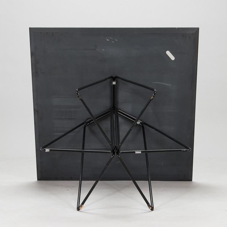 Lella and Massimo Vignelli, A "Paperclip" table in slate from Knoll 1994.
