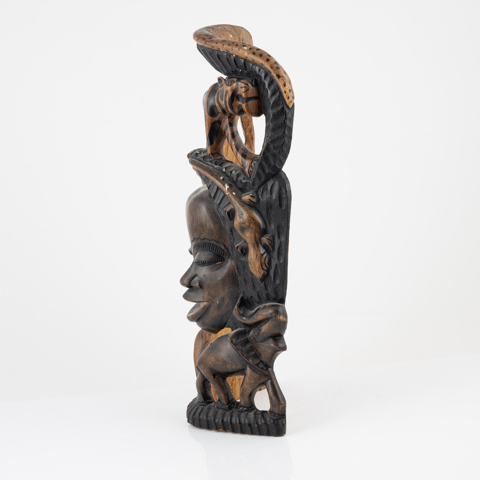 A wooden mask, Gambia, 21st Century.