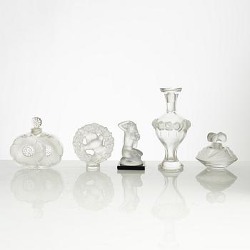 Lalique, four perfume bottles and five figurines, France, after 1945.