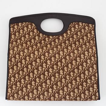 Christian Dior, a canvas tote bag.
