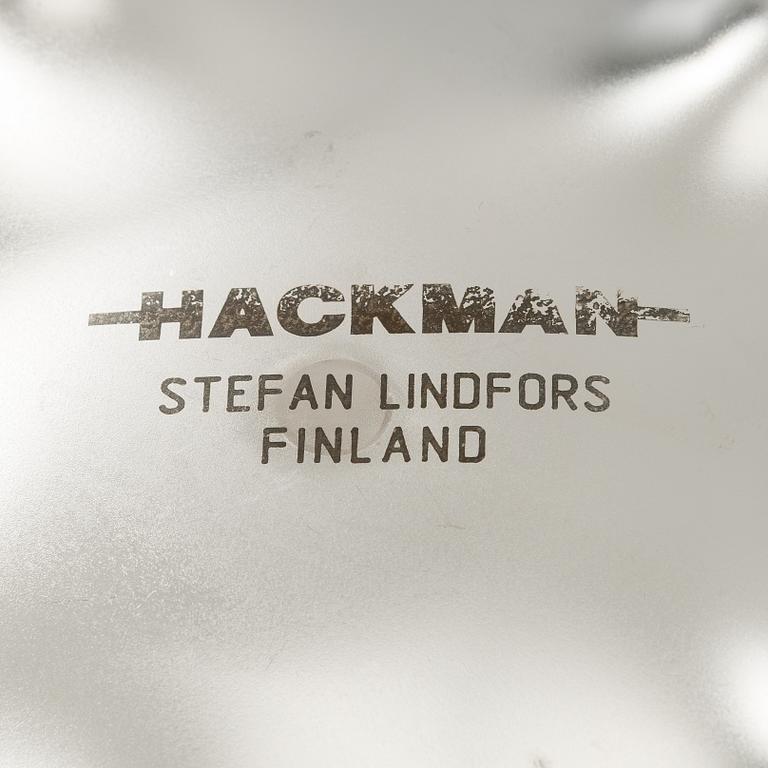 Stefan Lindfors, a stainless steel salad bowl with servers, Hackman, late 20th century.