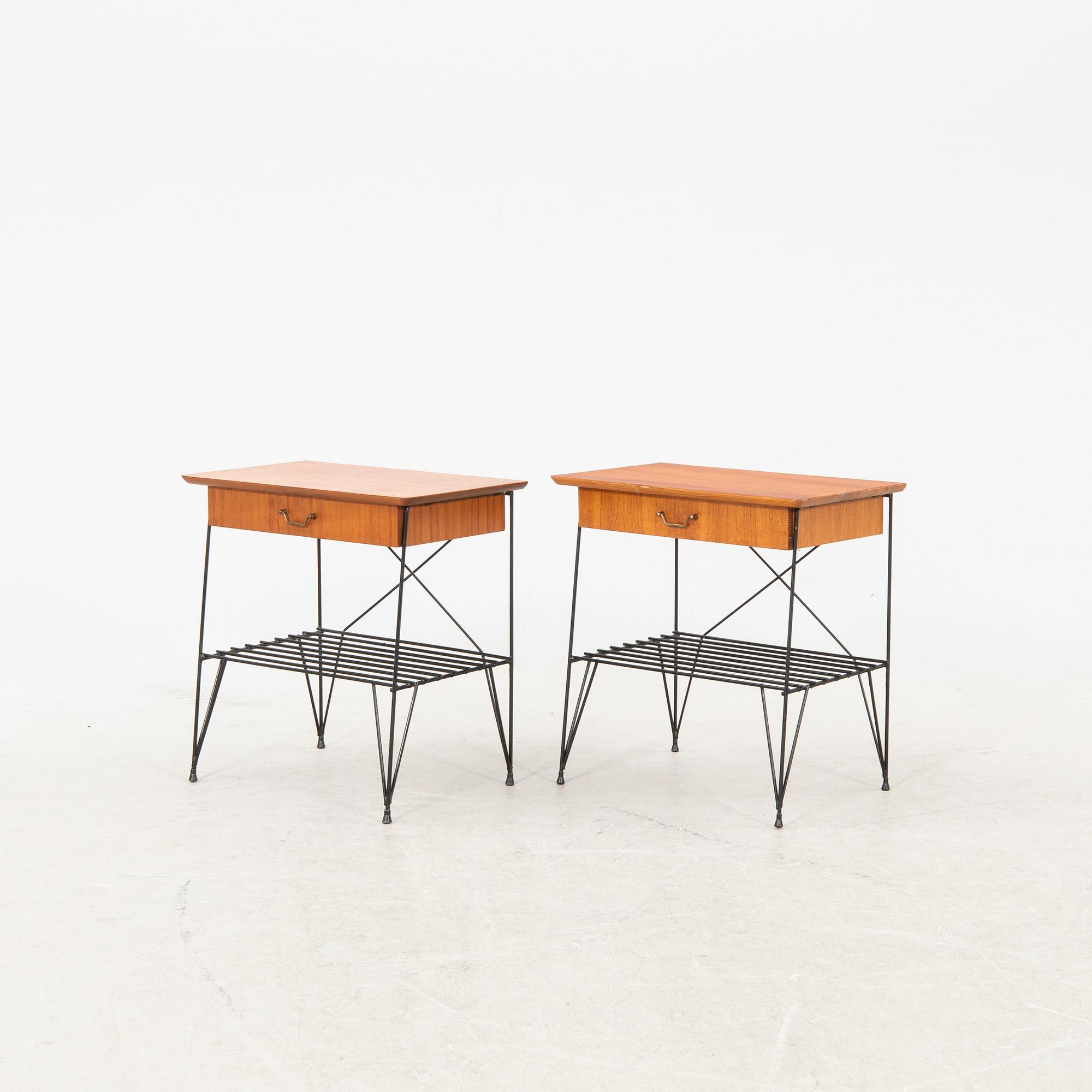 A pair of 1950s teak bedside tables.