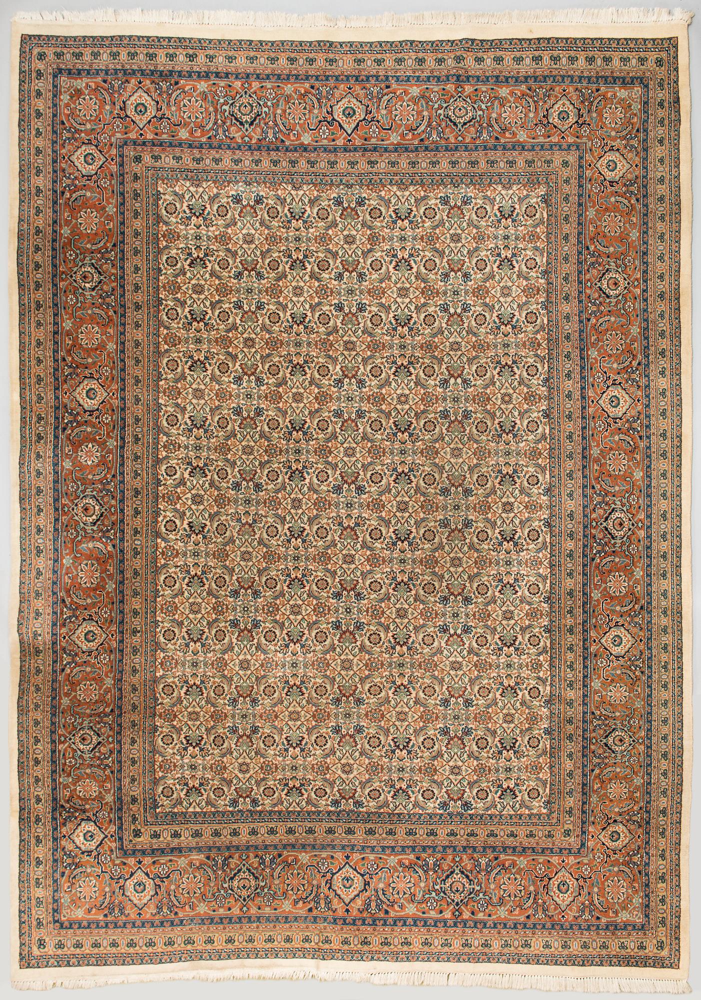 An oriental carpet. Circa 345x245 cm.