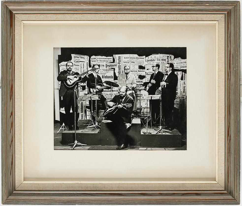 A SIGNED BLACK AND WHITE PHOTOGRAPH DEPICTING SWEDISH COMEDY GROUP "SKÄGGEN" CIRCA 1963.