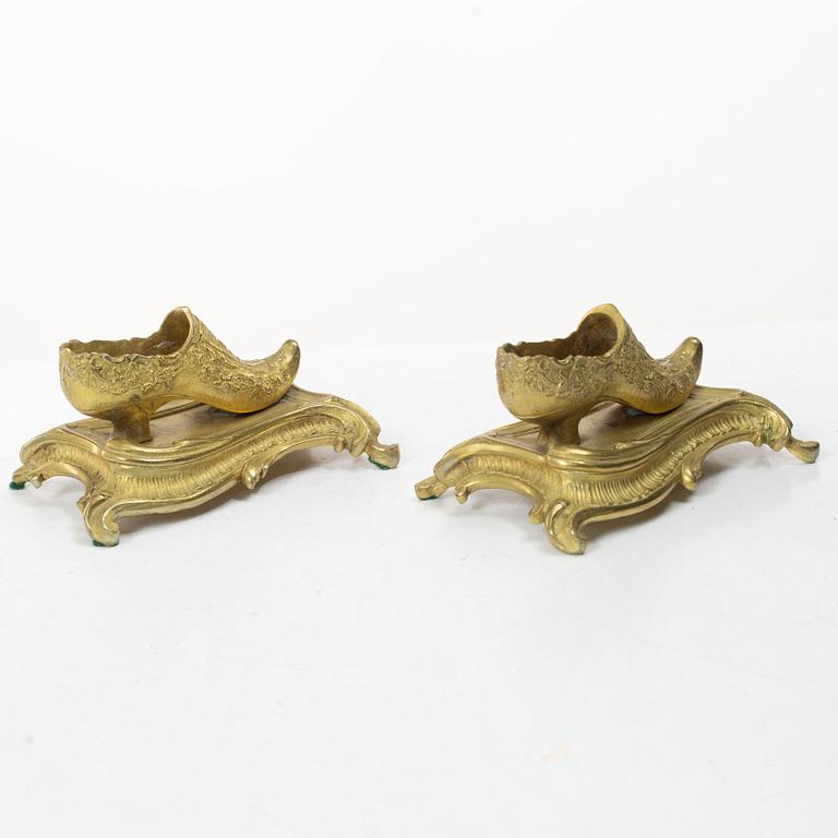 Table ornaments in the form of shoes, a pair, fire-gilt bronze, probably France, 19th century.