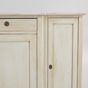 A cupboard, circa 1900.