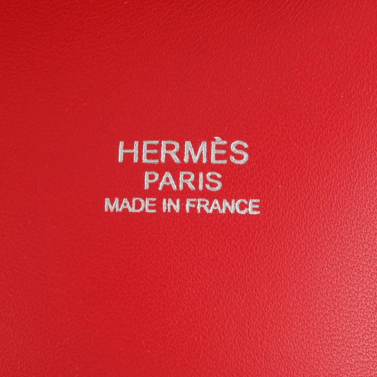 HERMÈS, a pink coral leather bag.