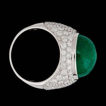A cabochon cut emerald, circa 12.34 cts and pavé set diamonds, circa 3.59 cts, ring.