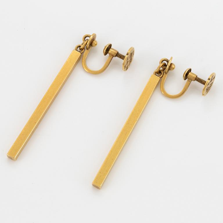 A pair of Wiwen Nilsson 18K gold earrings.