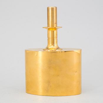 A Pierre Forssell brass decanter from Skultuna, Sweden.