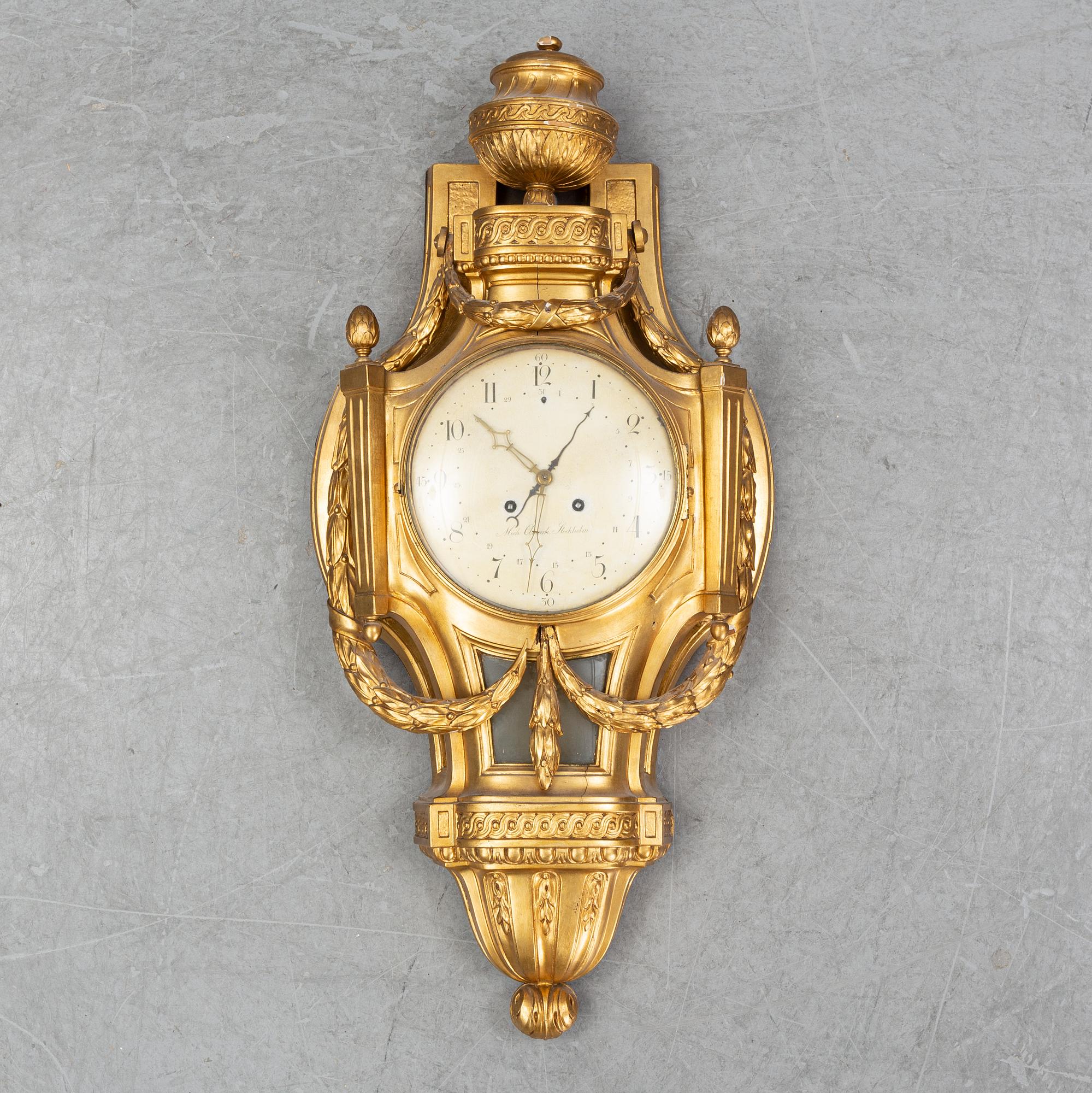 A Gustavian wall pendellum clock, by Michael Åmarck Stockholm, second half of the 18th Century.