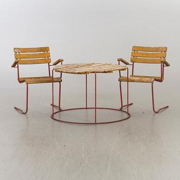 A mid 20th century Garden armchairs, easy chair and a table, Bjärnum, Sweden.