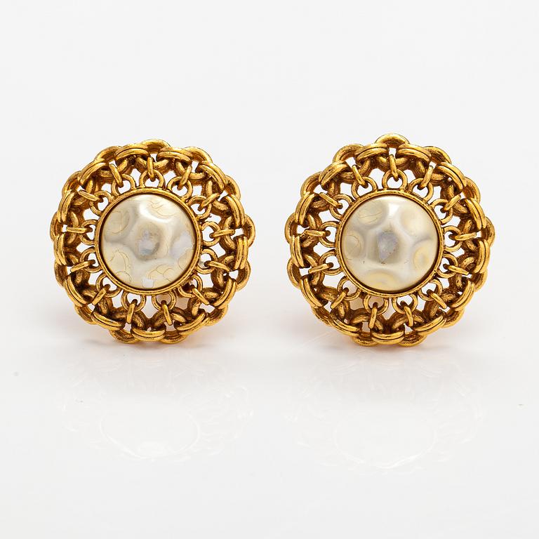 Chanel, A pair of gold coloured metal and faux pearl earrings. Marked Chanel 2 3 Made in France.