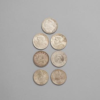 7. A group of seven silver coins, USA, Mexico and China, dated 1874-1920).