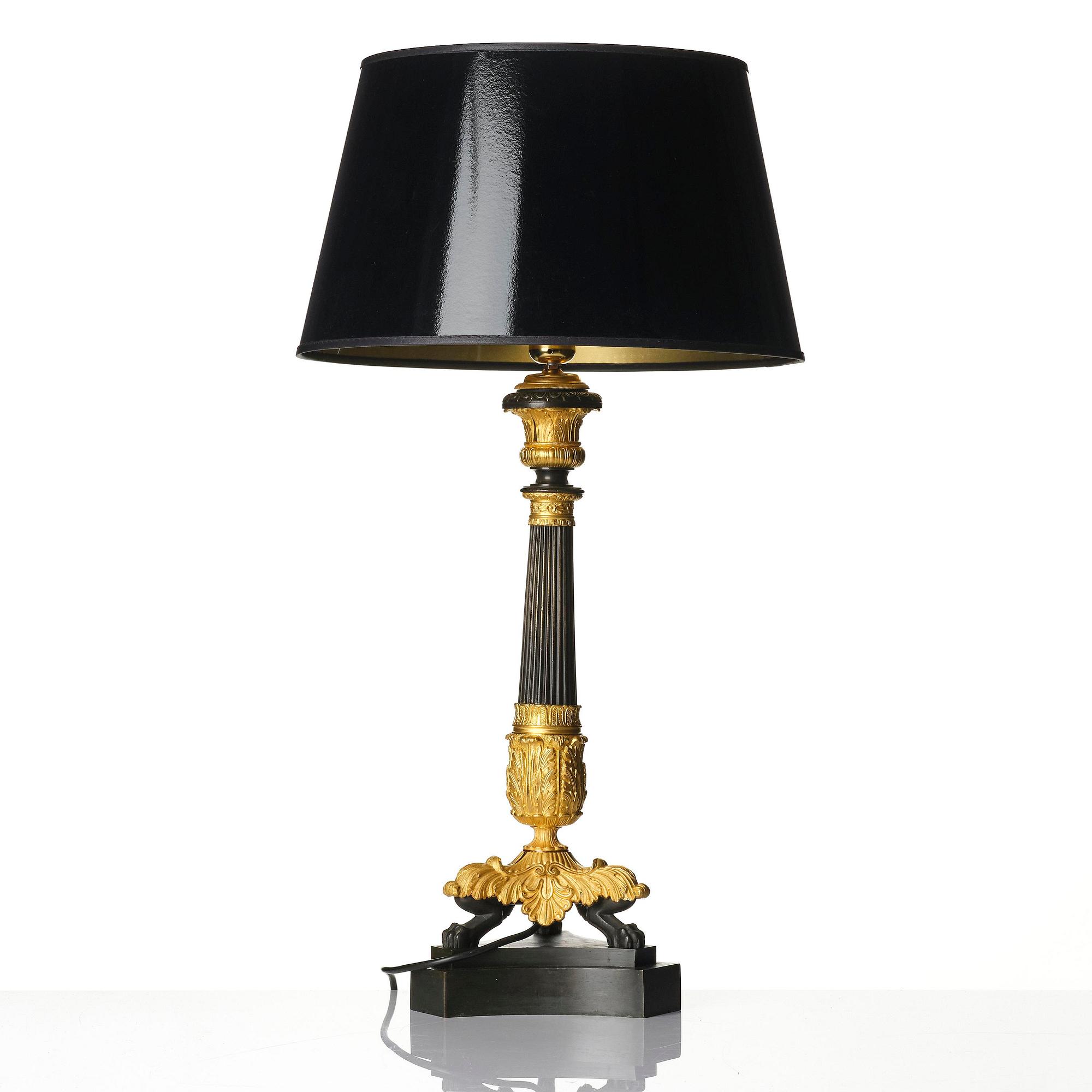 A French Louis Philippe ormolu and patinated bronze lamp, first part 19th century.
