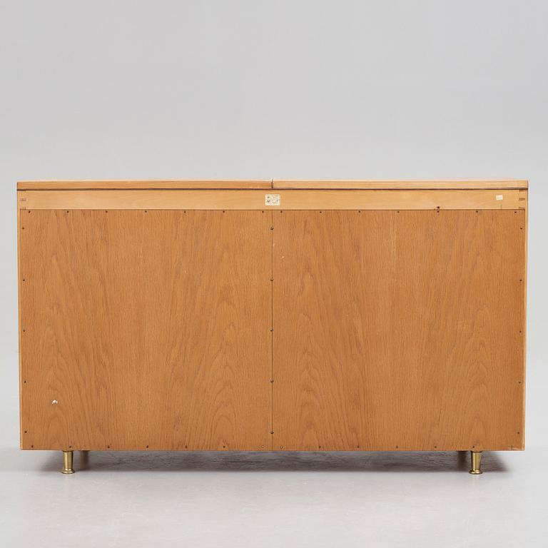 Bruno Mathsson, an elm veneered Swedish Modern sideboard executed by Karl Mathsson, Värnamo, Sweden 1938.