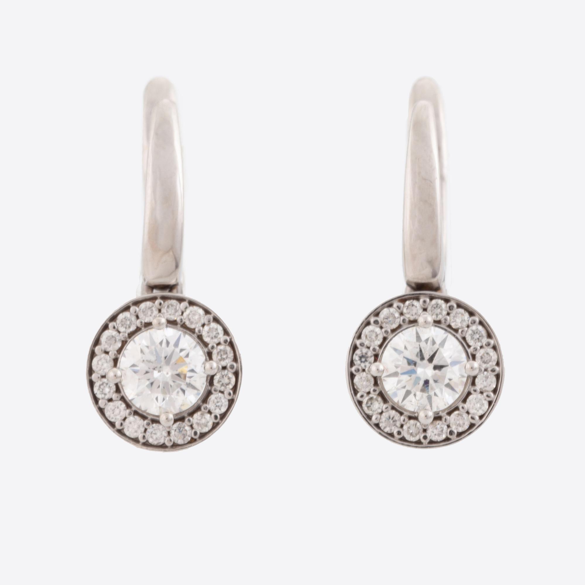 Brilliant-cut diamond earrings.
