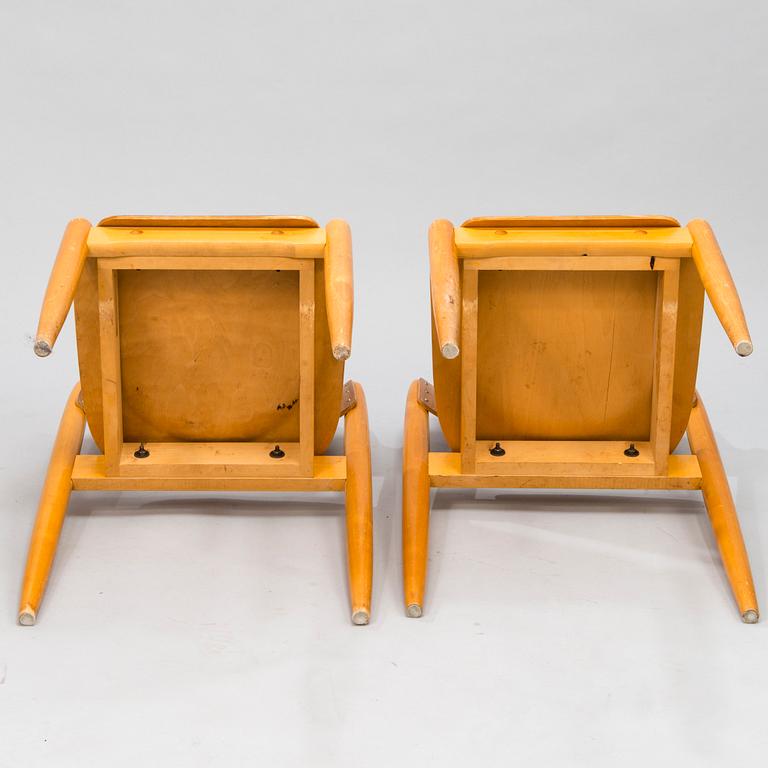 Two mid-20th-century "Wilman" chairs for Wilh. Schauman, Fanerfabrik, Jyväskylä, Finland.