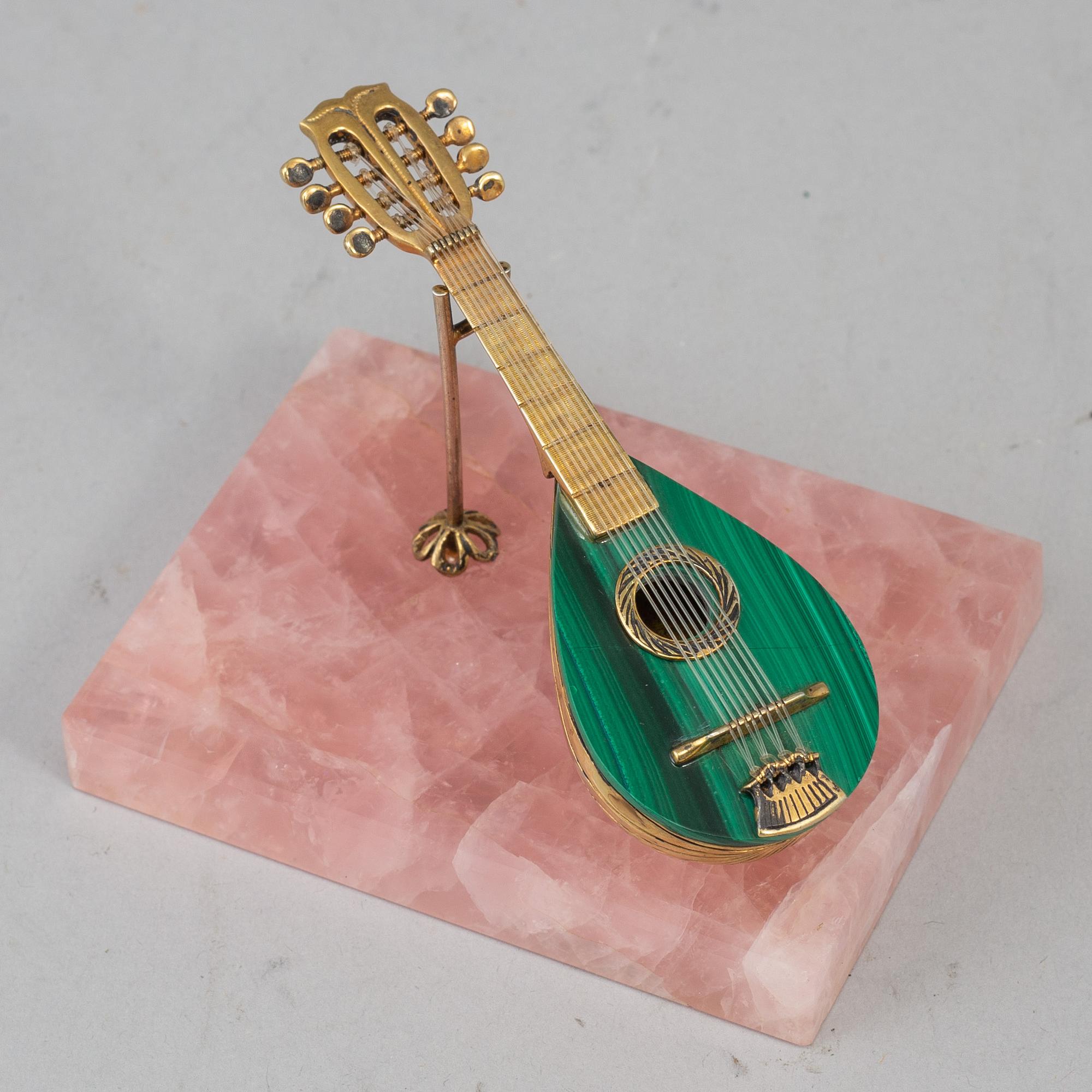 An Italian silver gilt and malachite miniature guitar, first half of the 20th century.
