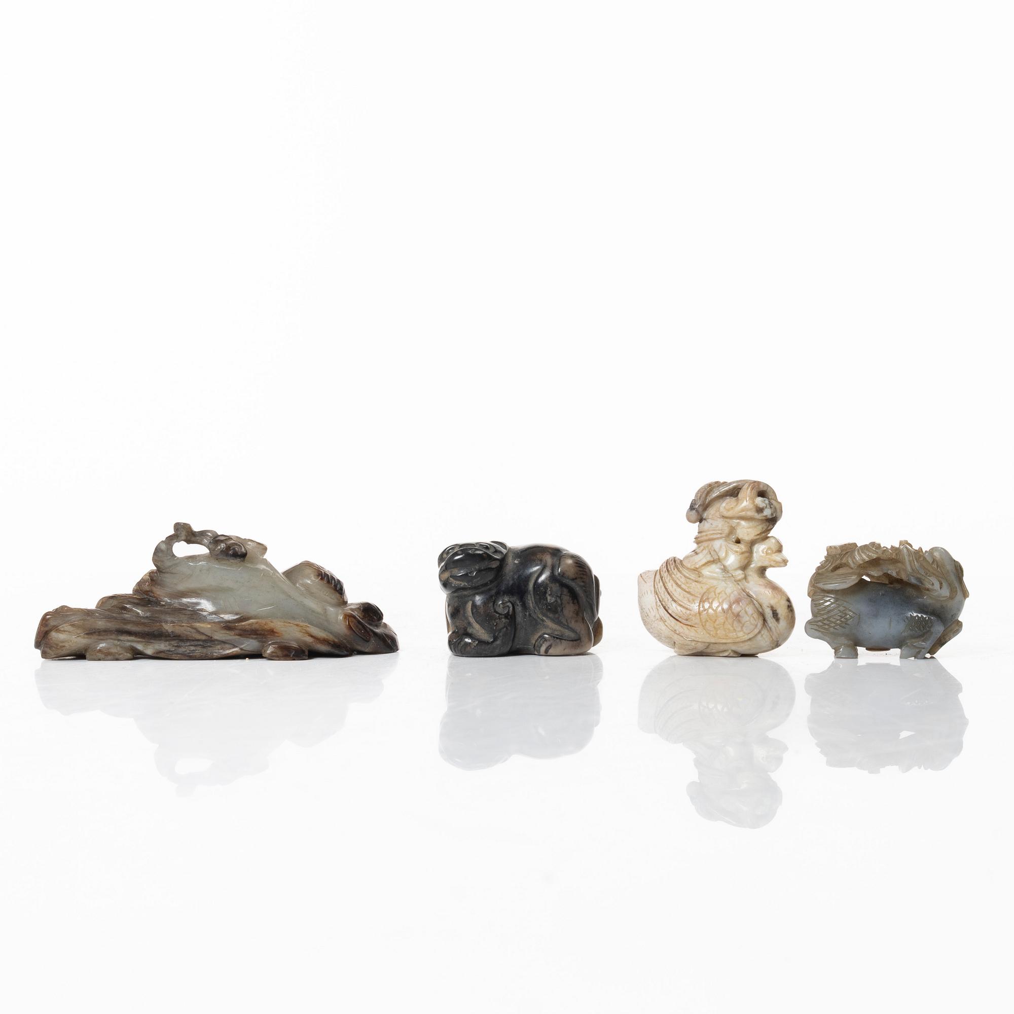 A group of four Chinese stone figures, 20th century.