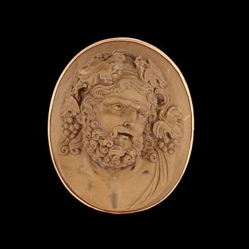 1150. A carved lava cameo brooch. 19th century.
