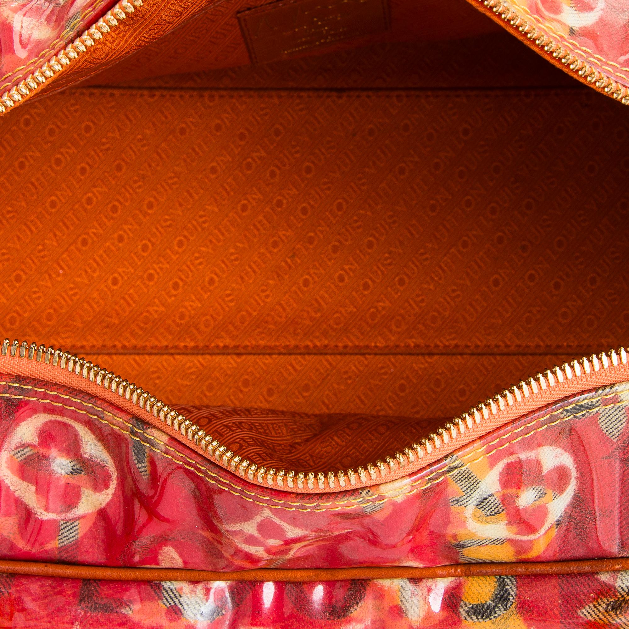 Louis Vuitton, a 'Le Rose Defile Denim Pulp PM' bag design Richard Prince.