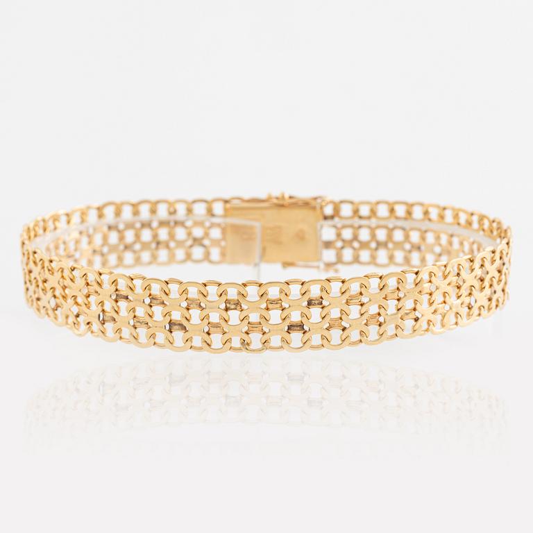 Armband 18K guld, x-länk.