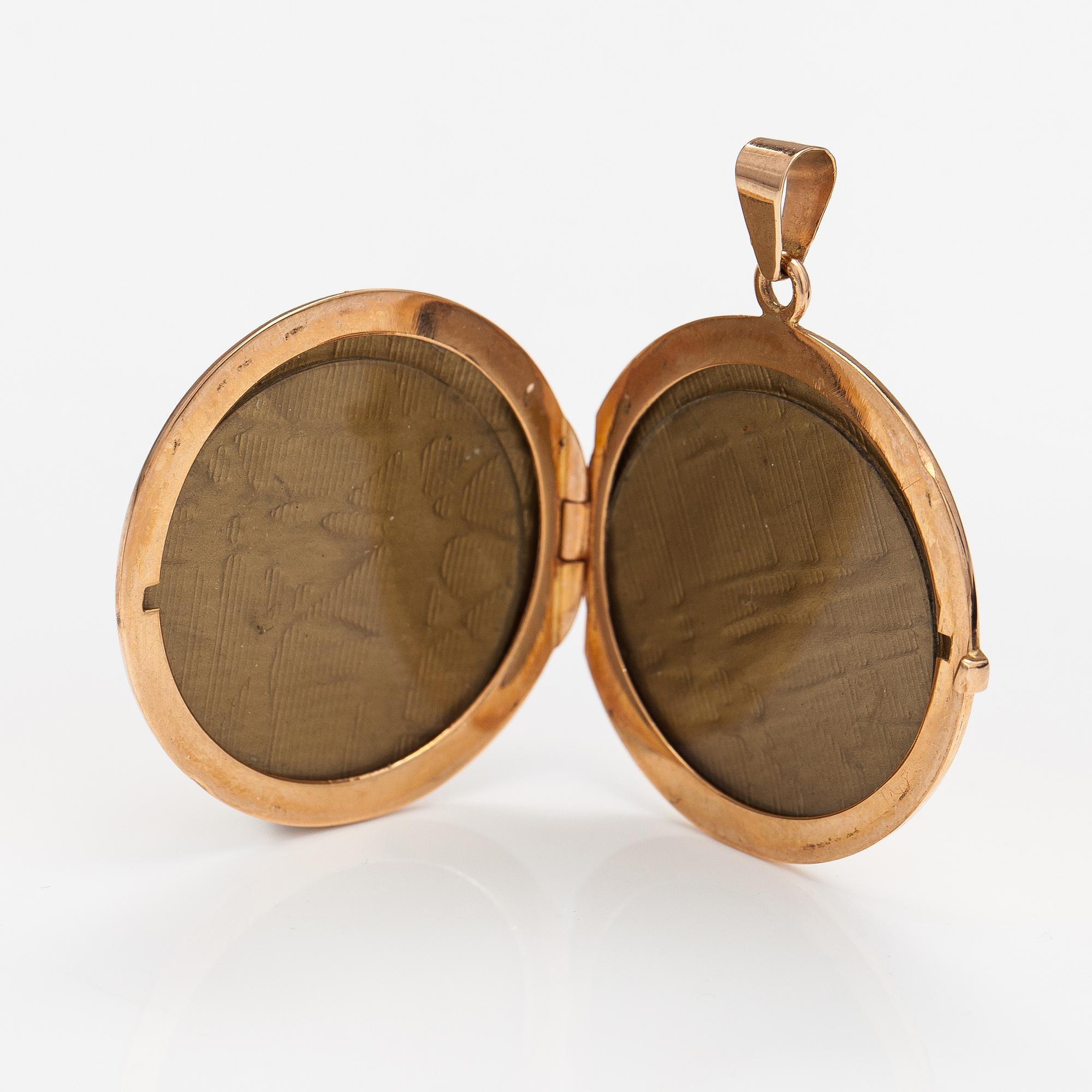 A 14K gold locket. Finnish import marks.
