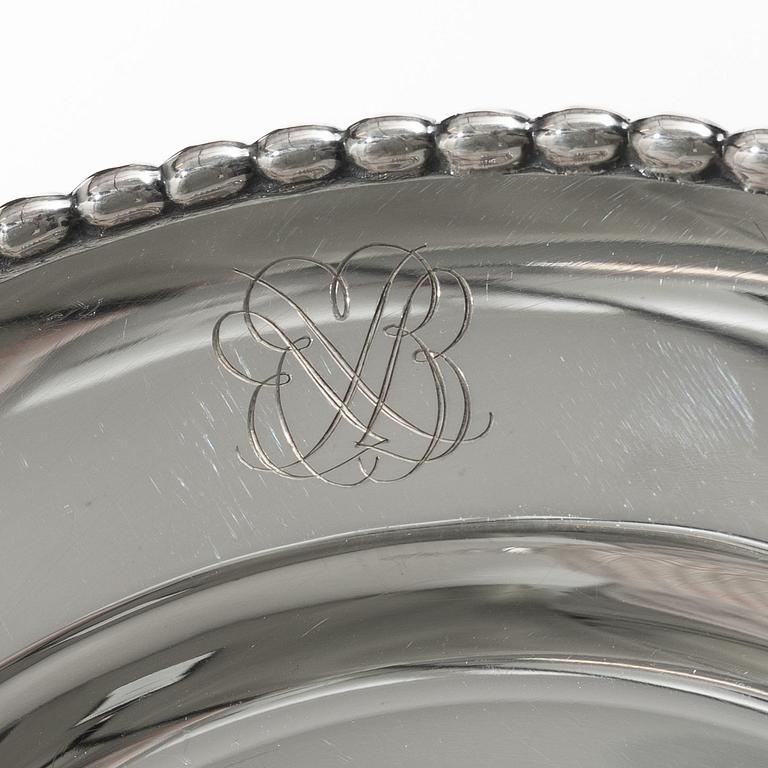 12 plates and 12 side plates, silver, marks of GAB and Edlund's silverware factory, Stockholm 1946 and 1974.