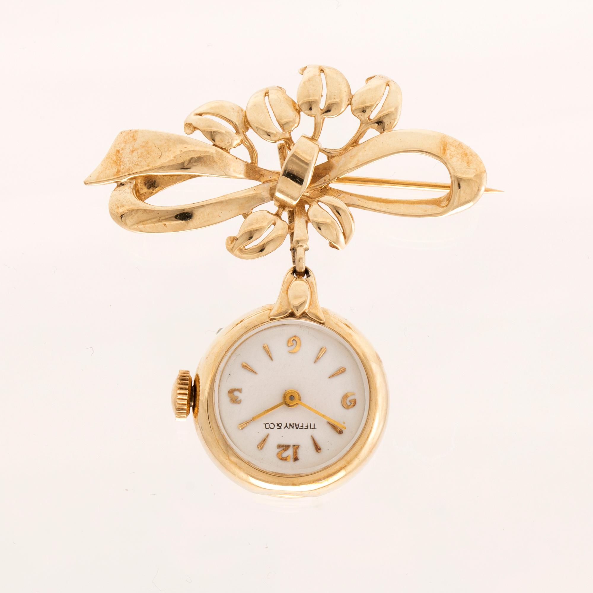 Tiffany & Co fickur/brosch 14K guld.