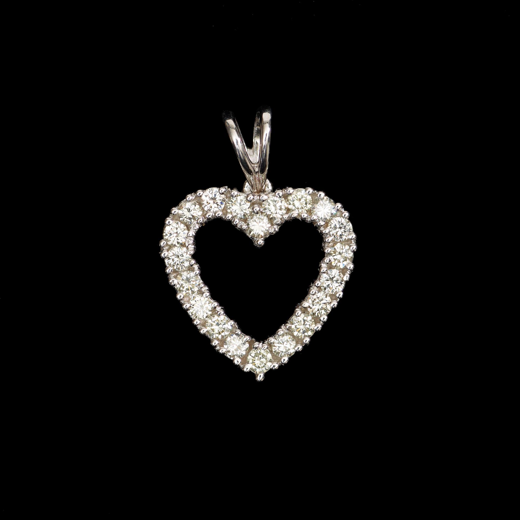 PENDANT, 20 brilliant cut diamonds, tot. app. 0.80 cts.