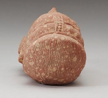 A mottled red sandstone head of Guanyin, Mathura, India, presumably 200-500 AD.