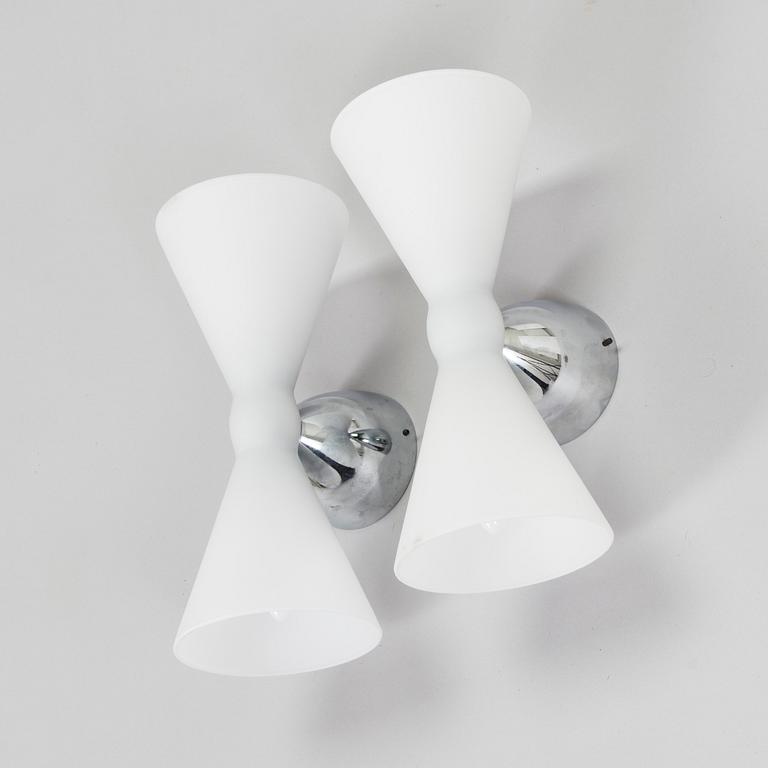 A pair of early 2000s wall lamps.