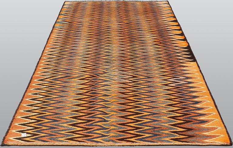 A carpet, Persian Nomad Kilim, ca 267 x 145 cm.