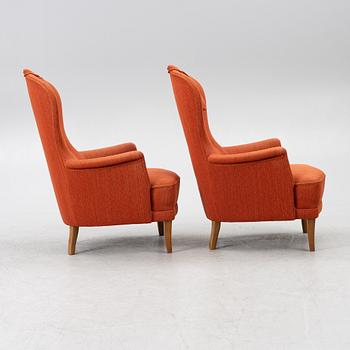 Carl Malmsten, a pair of "Farmor" armchairs, O.H.Sjögren, Sweden, later part of the 20th century.