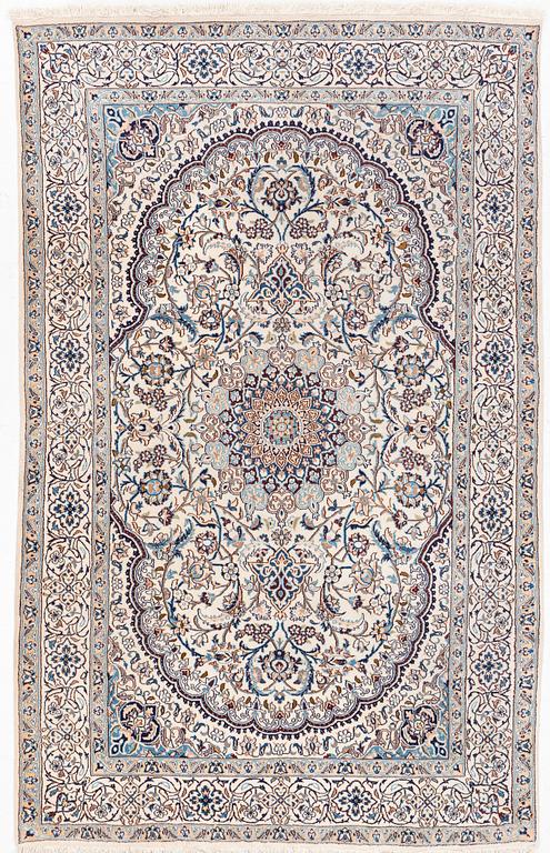 A Nain carpet, c. 310 x 195 cm.