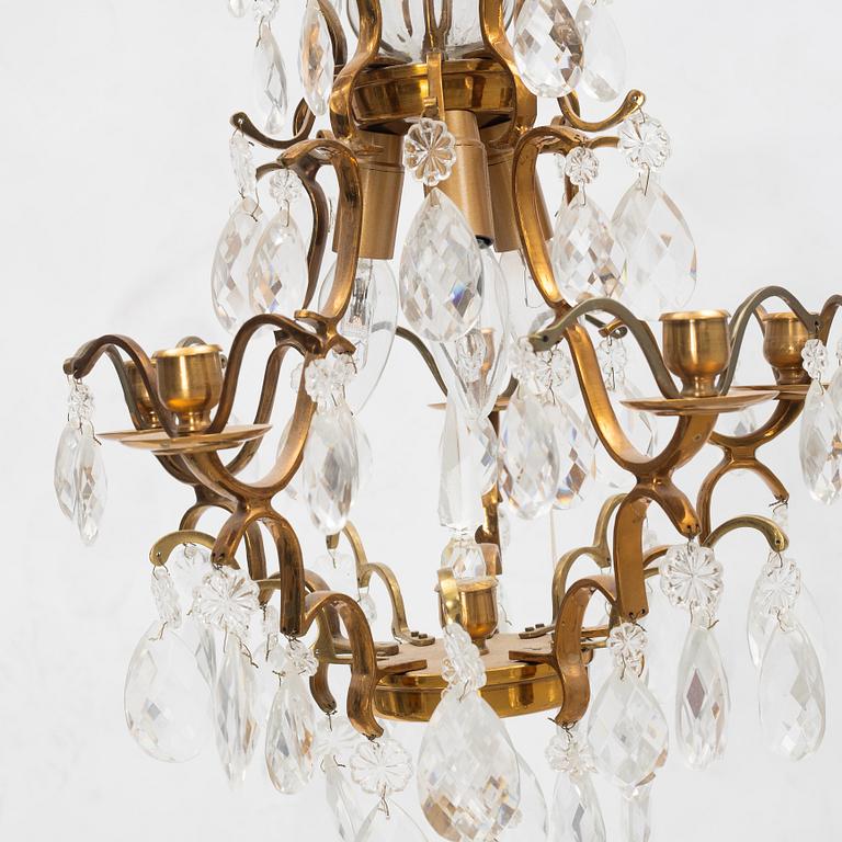 A Rococo style chandelier, mid 20th century.