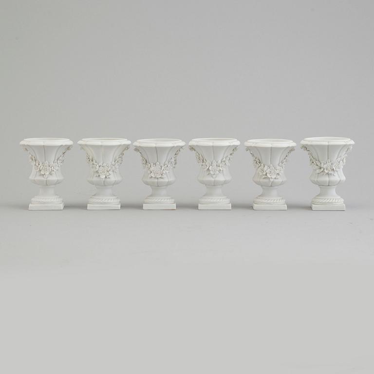 Six bisquit porcelain miniture vases, circa 1900, with Sevres like mark.