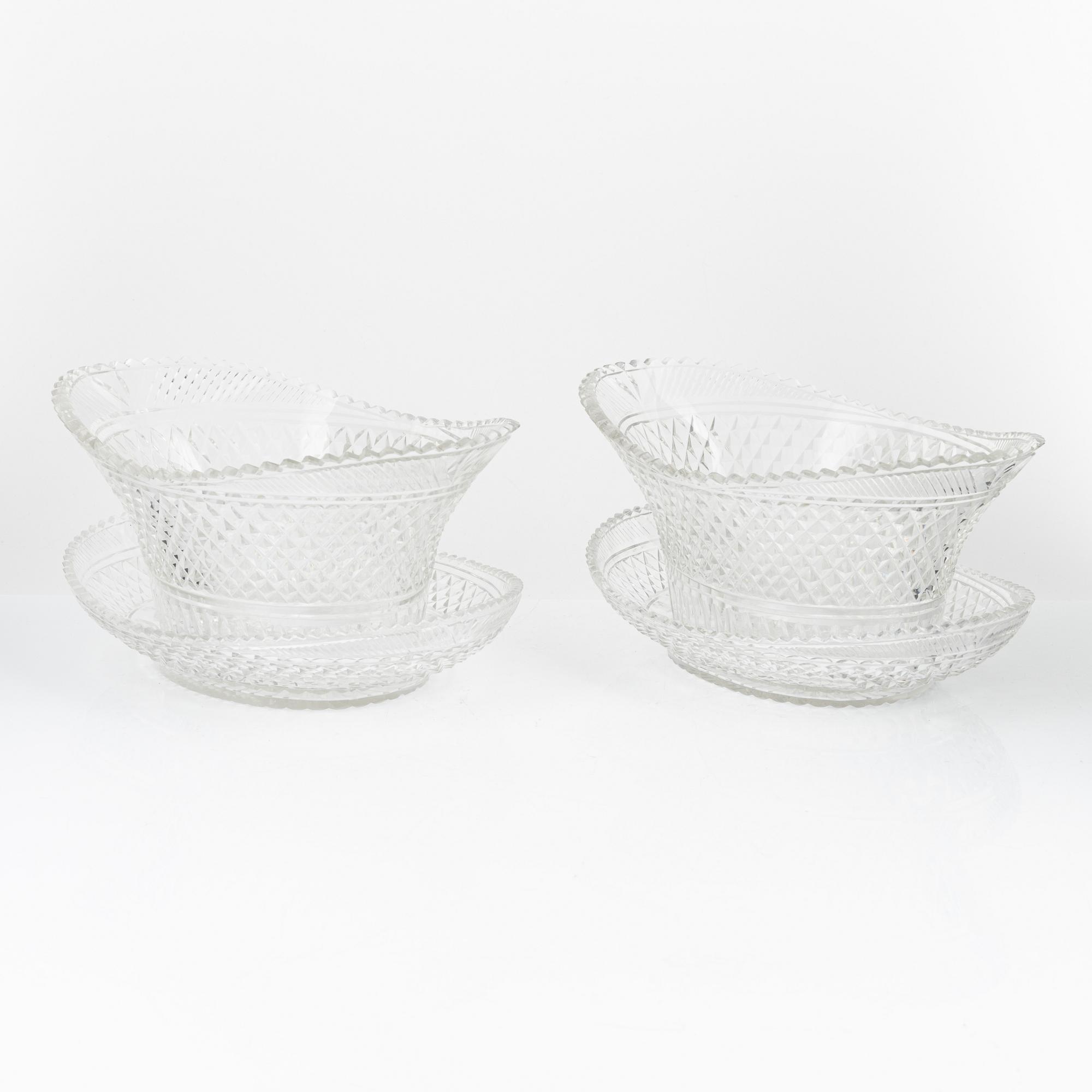 A pair of cut glas jardiieres on stands, 19th Century.
